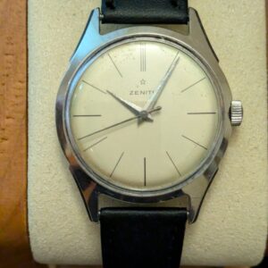 montre Zenith vintage calibre 106-50 cadran argent boitier acier